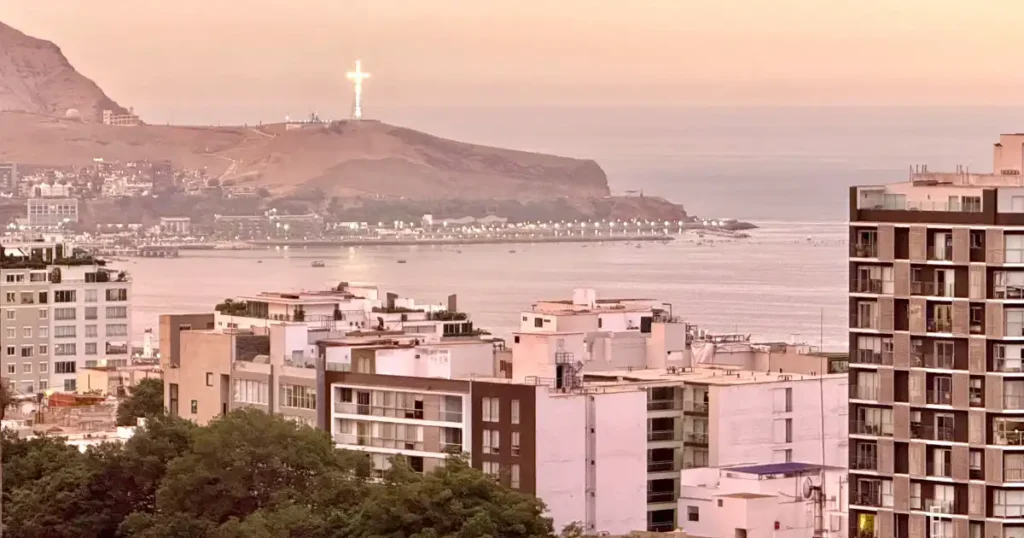 Golden Hour image of Pacific and Cross from High Rise in Lima Peru