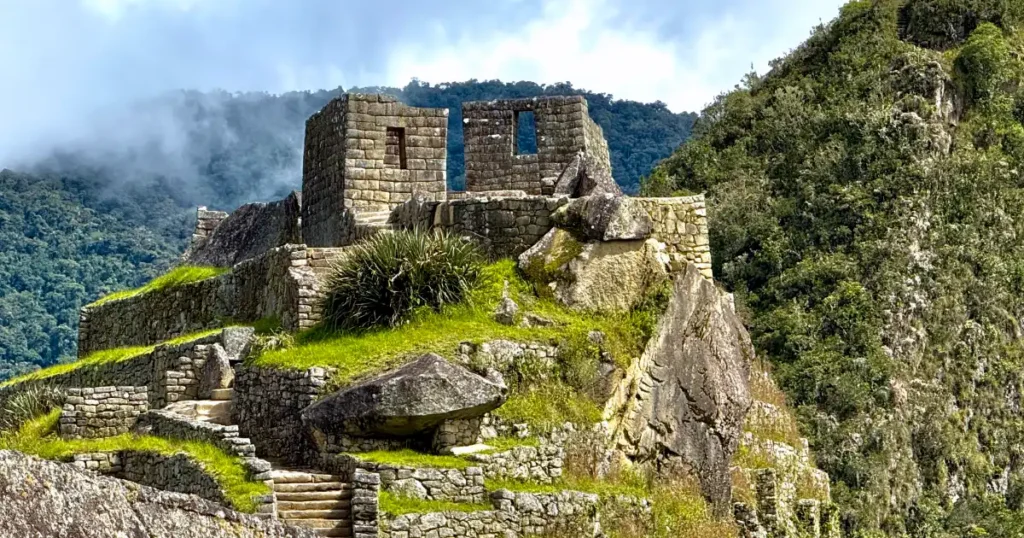 Temple of the Sun at Machu Picchu at an earl time